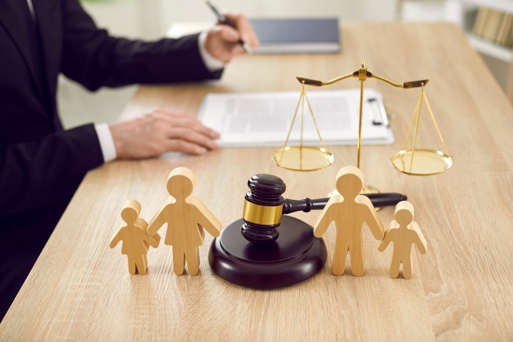 Judges Hammer Between Toy Family