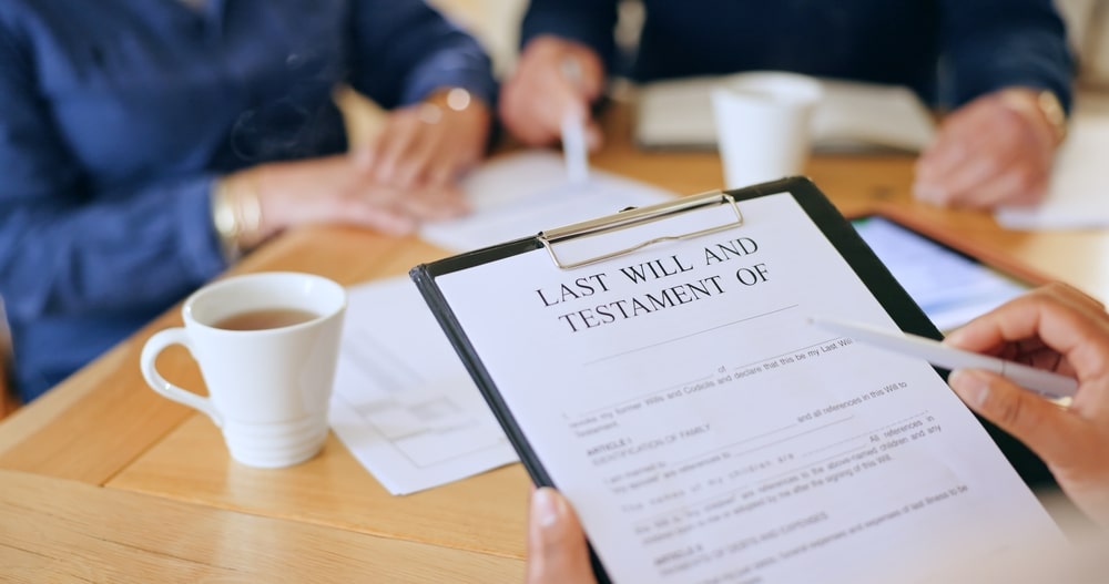 WIll And Testament Person Holding Last Will And Testament Document